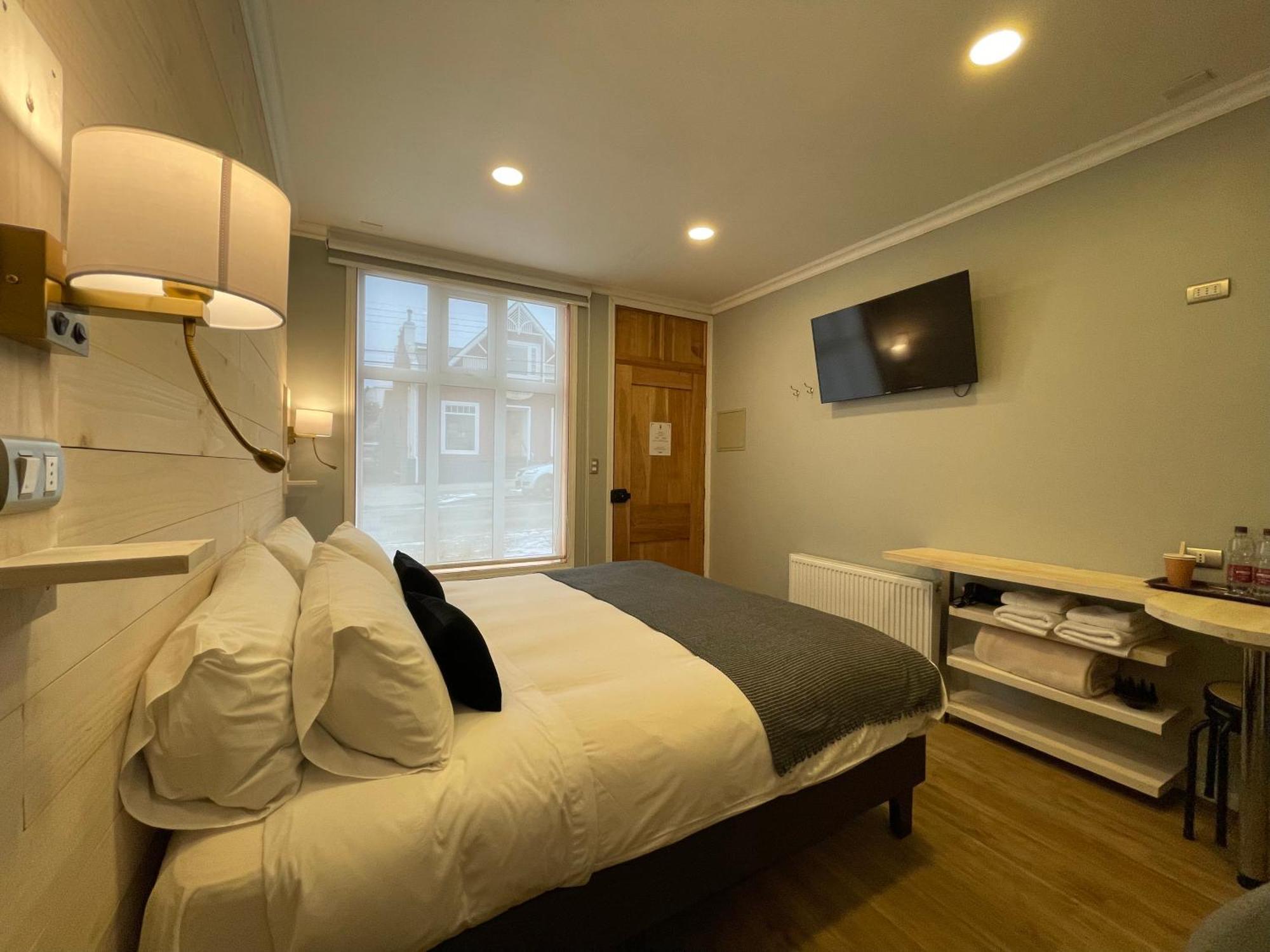 Hostal Boutique Puerta Roja بونتا أريناس المظهر الخارجي الصورة